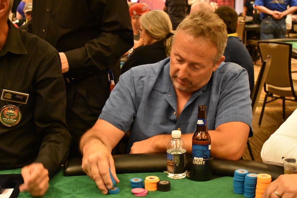 Ken Shaw, counts his chips after the elimination 
